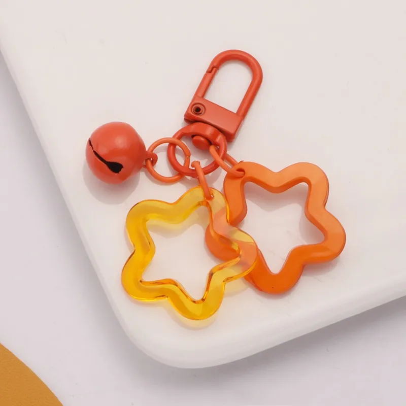 Promotion Acrylic hollowed out pentagram ins pendant keychain accessories Star keyring Cute candy color Star Bell Keychain charm