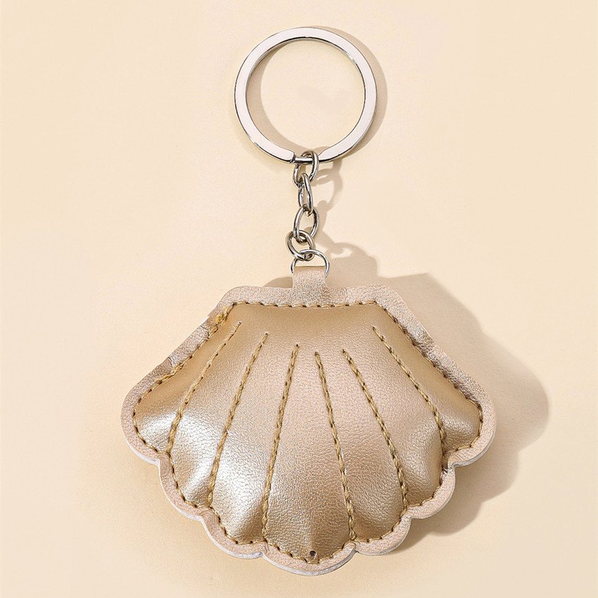 Hot sale PU filled cotton shell lady bag pendant clothing accessories gold leather shell car keychain