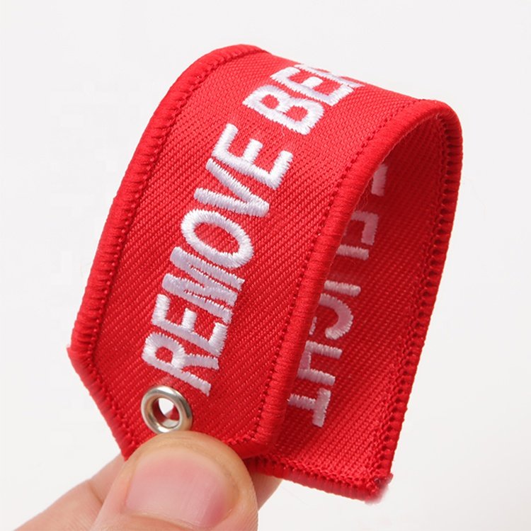 Embroidered Keychains OEM Factory Custom Made Logo Embroidery Key Chains for Airplane Remove Before Flight