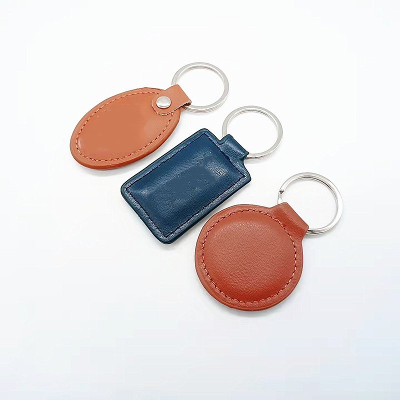 Xun Xin Customize Creative PU Keychain Genuine Leather Keychain Car Key Pendant Embossed Silk Screen Printing Logo Gift Keychain