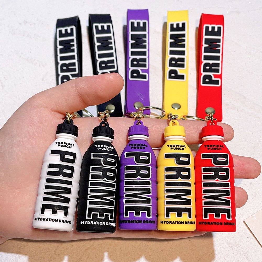 Hot Selling Prime Pvc Cartoon 3d Silicon Key Chain Gift Ornament Car Bag Pendant 3d Rubber Prime Drink Keychain
