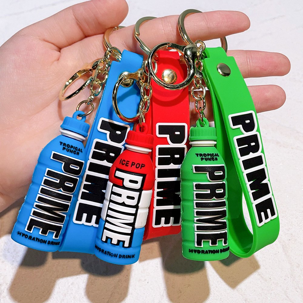 Hot Selling Prime Pvc Cartoon 3d Silicon Key Chain Gift Ornament Car Bag Pendant 3d Rubber Prime Drink Keychain
