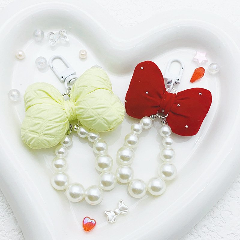 Wholesale cute bow keychain sweet purple beaded keychain pearl pendant bag pendant car keychain mobile phone chain