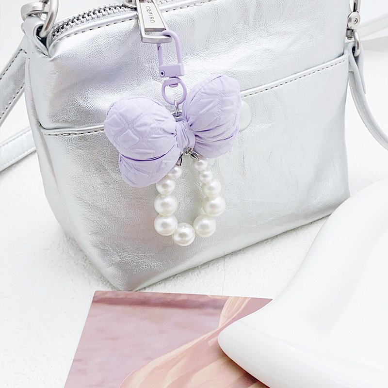 Wholesale cute bow keychain sweet purple beaded keychain pearl pendant bag pendant car keychain mobile phone chain