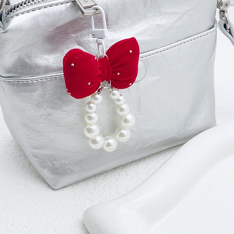 Wholesale cute bow keychain sweet purple beaded keychain pearl pendant bag pendant car keychain mobile phone chain