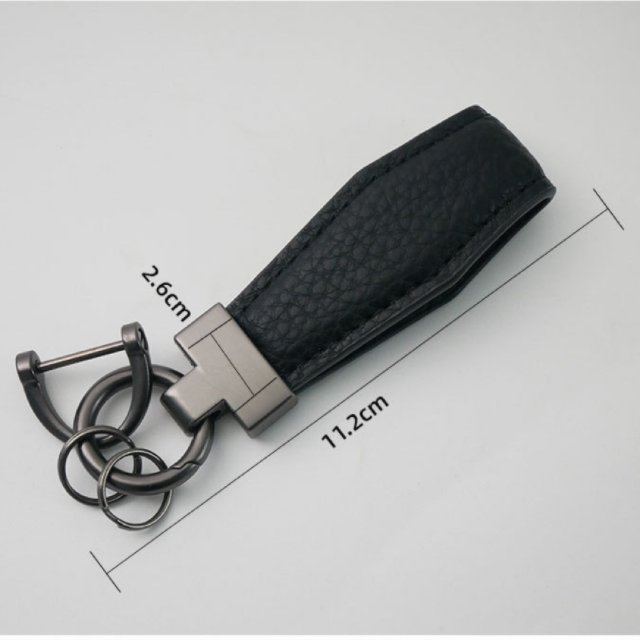 First layer calfskin car keychain Fashion leather keychain ring Alloy pendant Creative men's and women's leather lanyard