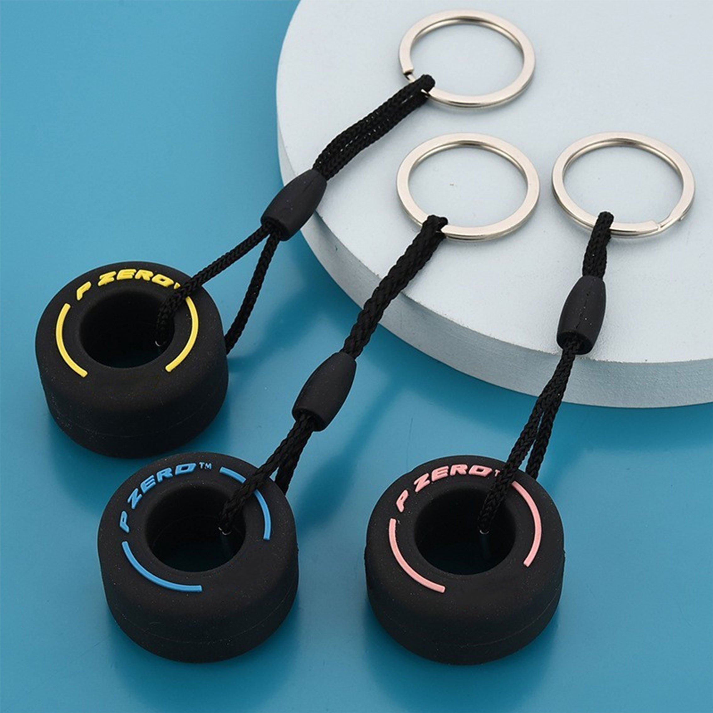 PVC soft rubber personalized creative tire keychain, colorful car key decoration small pendant.