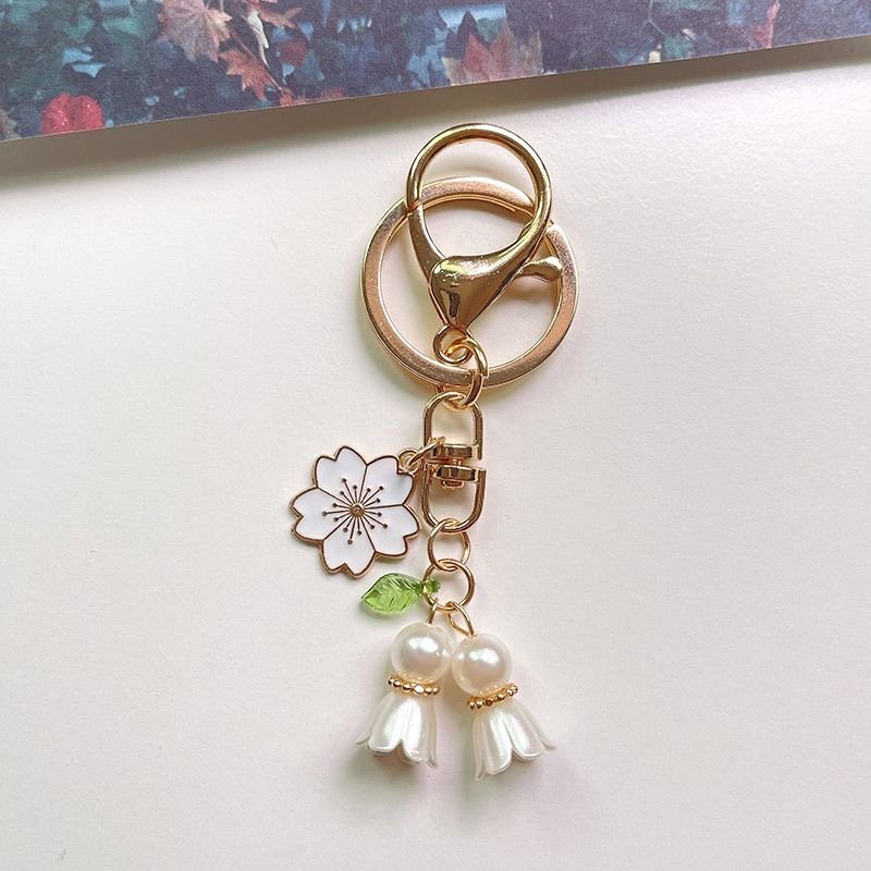 New fashion lily of the valley keychain Cute Metal enamel Orchid Sakura accessories Keychain Bag car key pendant