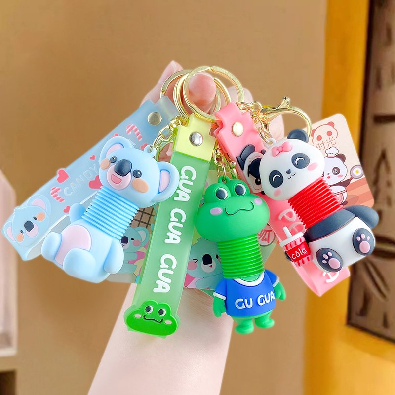 Wholesale Creative Telescopic Glue Drop Doll Key Chain Cute Cartoon Car Women's Book Bag Pendant Rubber Couple Small Gift