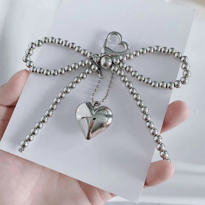 Wholesales Korean Chic New Sweet Pearl Bow Silver Love Pendant Car Keychain Airpods Pendant Phone strap