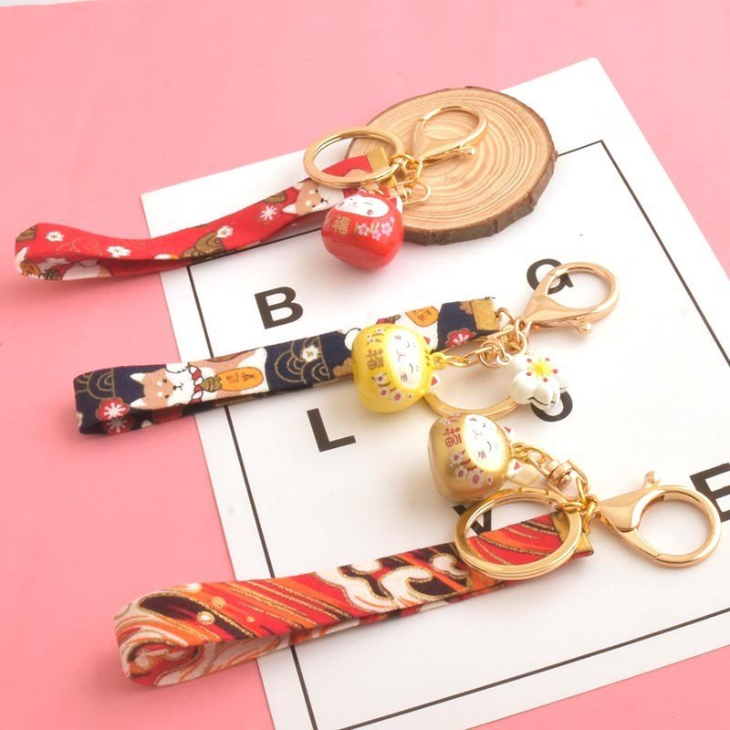 Supplier Japanese Cute Lucky Cat KeyChains Car Key Chains Water Sound Bell Pendent Charm keychain accessories with Wrist Straps