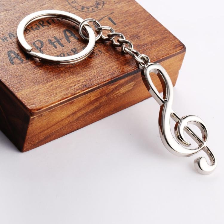 Creative gifts, musical symbols, men's and women's car bag accessories key ring