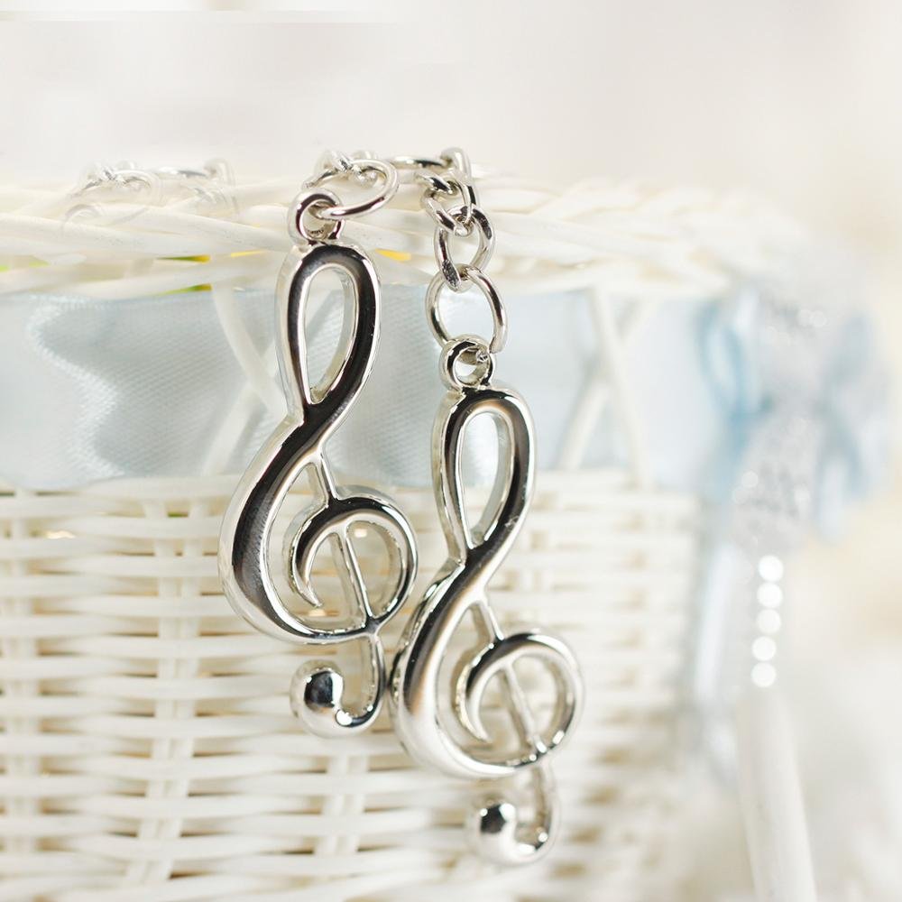 Creative gifts, musical symbols, men's and women's car bag accessories key ring