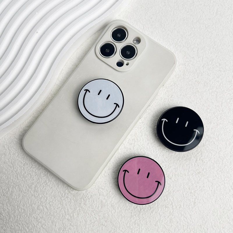 Popular Simple Cute Smile Stand Foldable Desktop Phone Stand Phone Grip Mobile Phone Holder