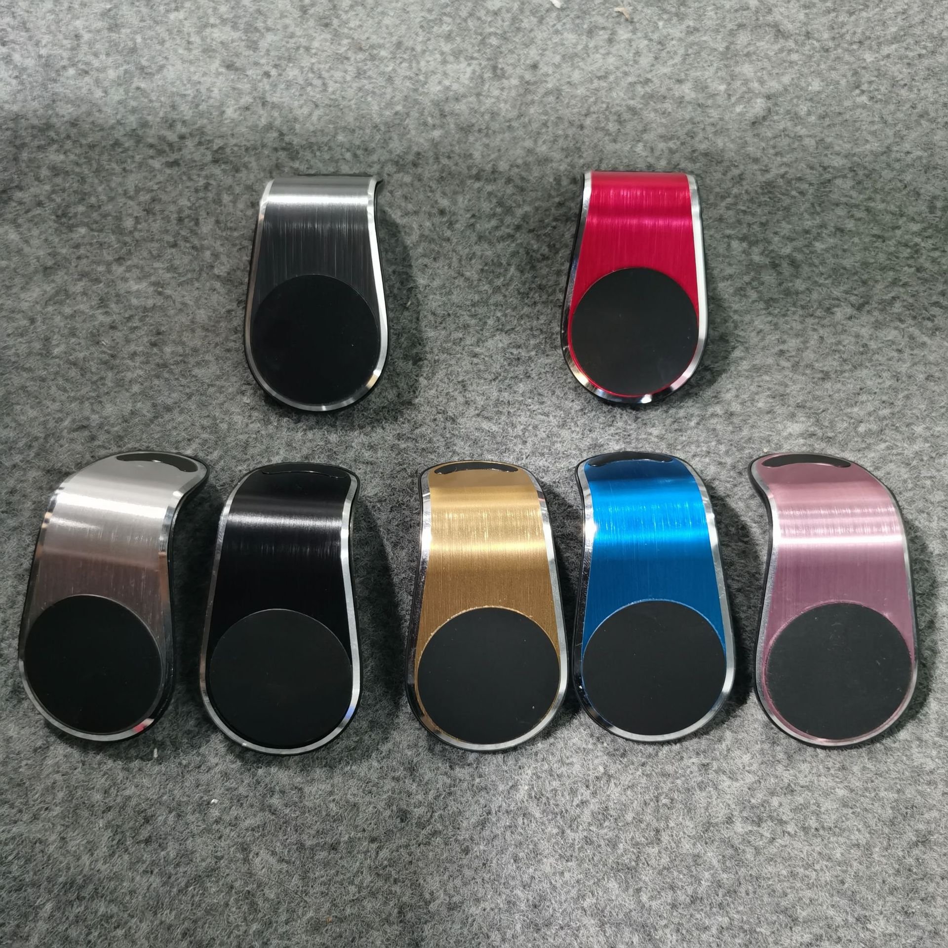 Car mobile phone rack magnetic suction navigation sucker type car air outlet supplies car inside creative strong magnetic holder