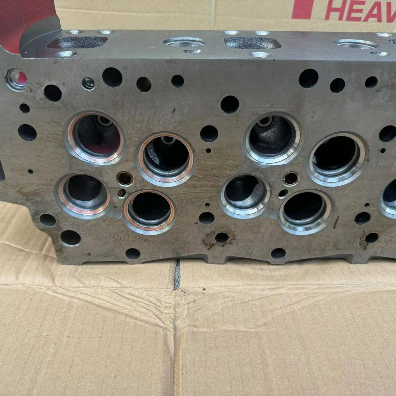 Automobile Kobelco excavator engine cylinder head 11101-E0531 for J05E J08E for Hino spare parts