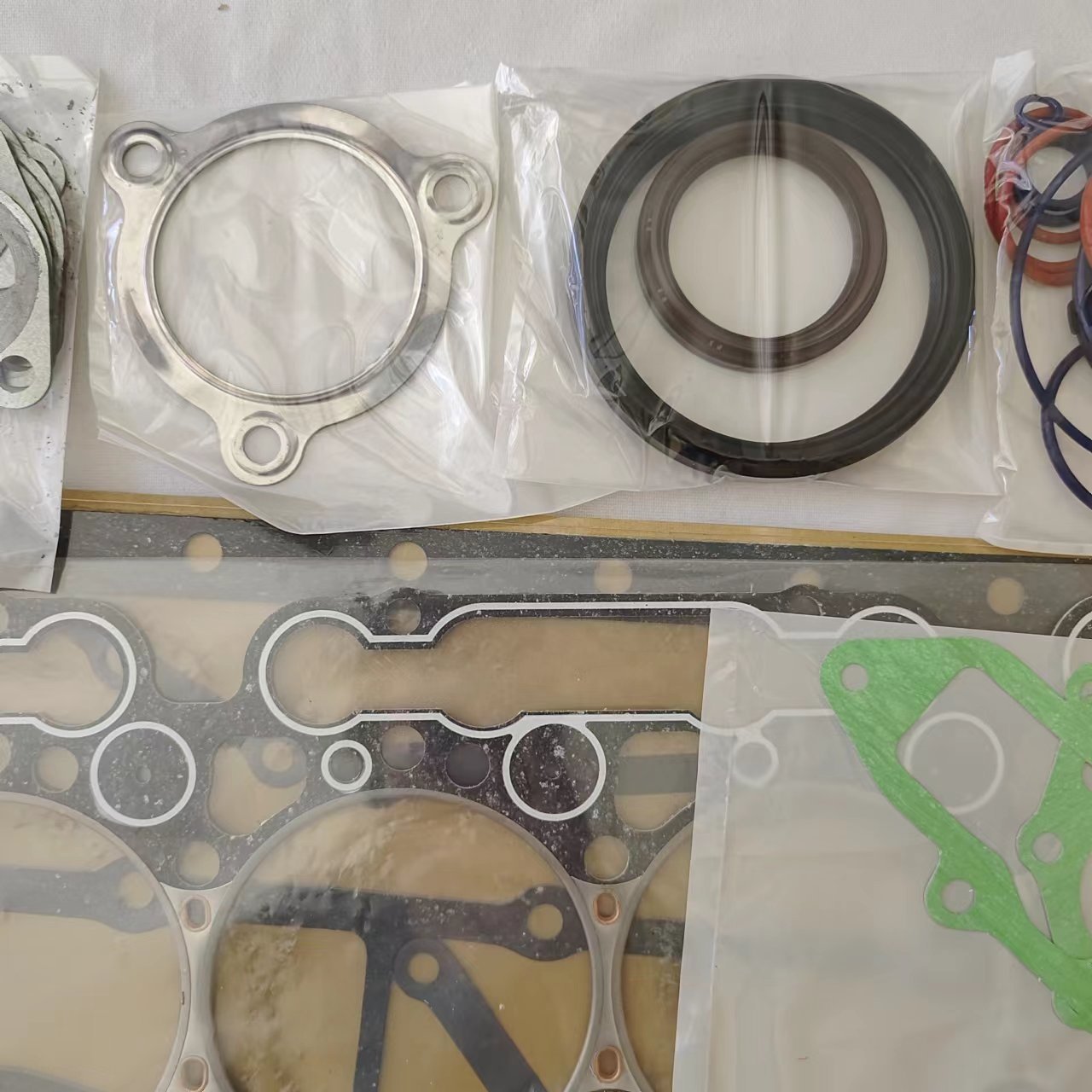 w06d w06e wo6e wo6d engine gasket kit for hino w06d w06e wo6e wo6d cylinder head gasket 04010-0254 04010-0315
