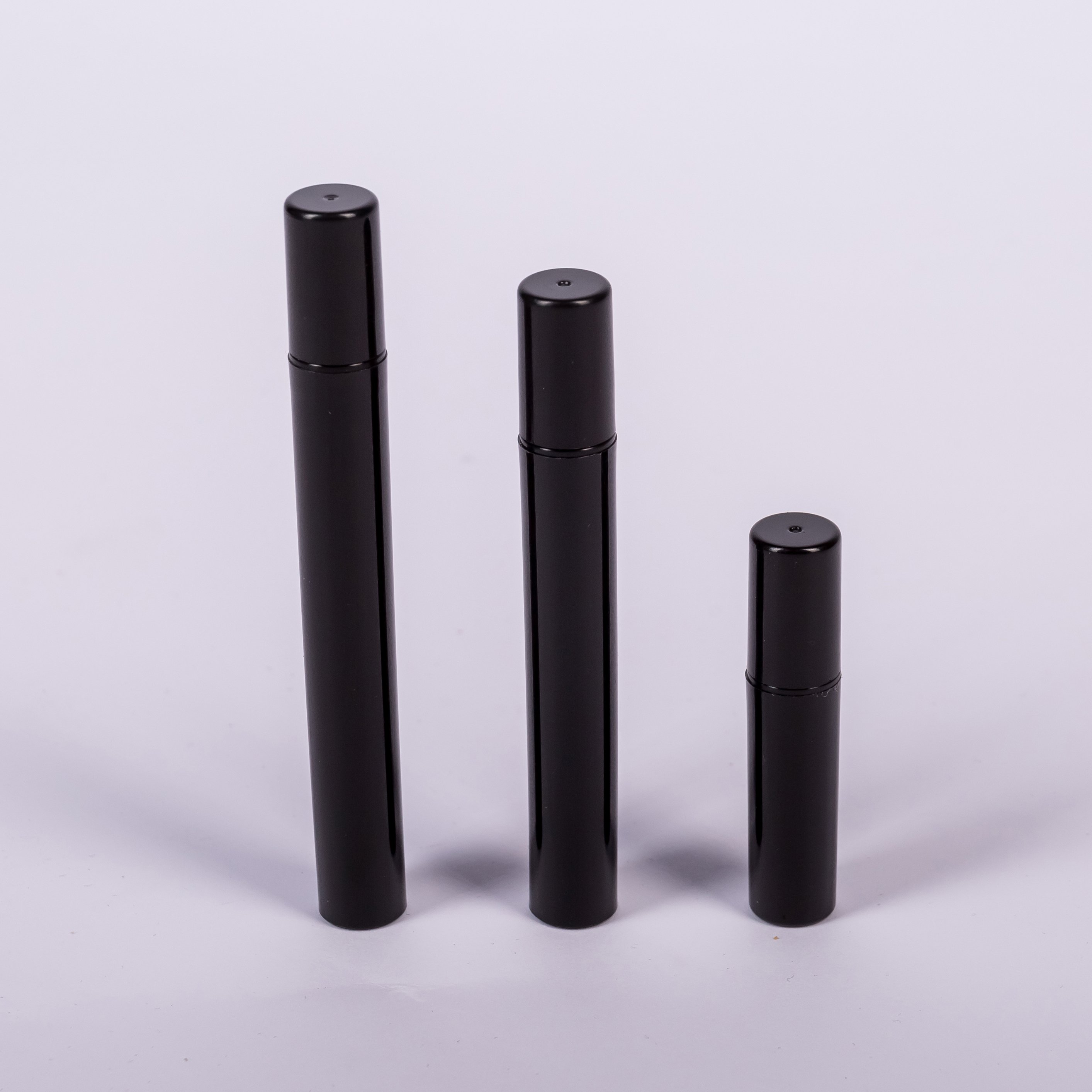 Cheap small nini plastic sprayer clear black white empty click cap portable 2ml perfume spray bottles