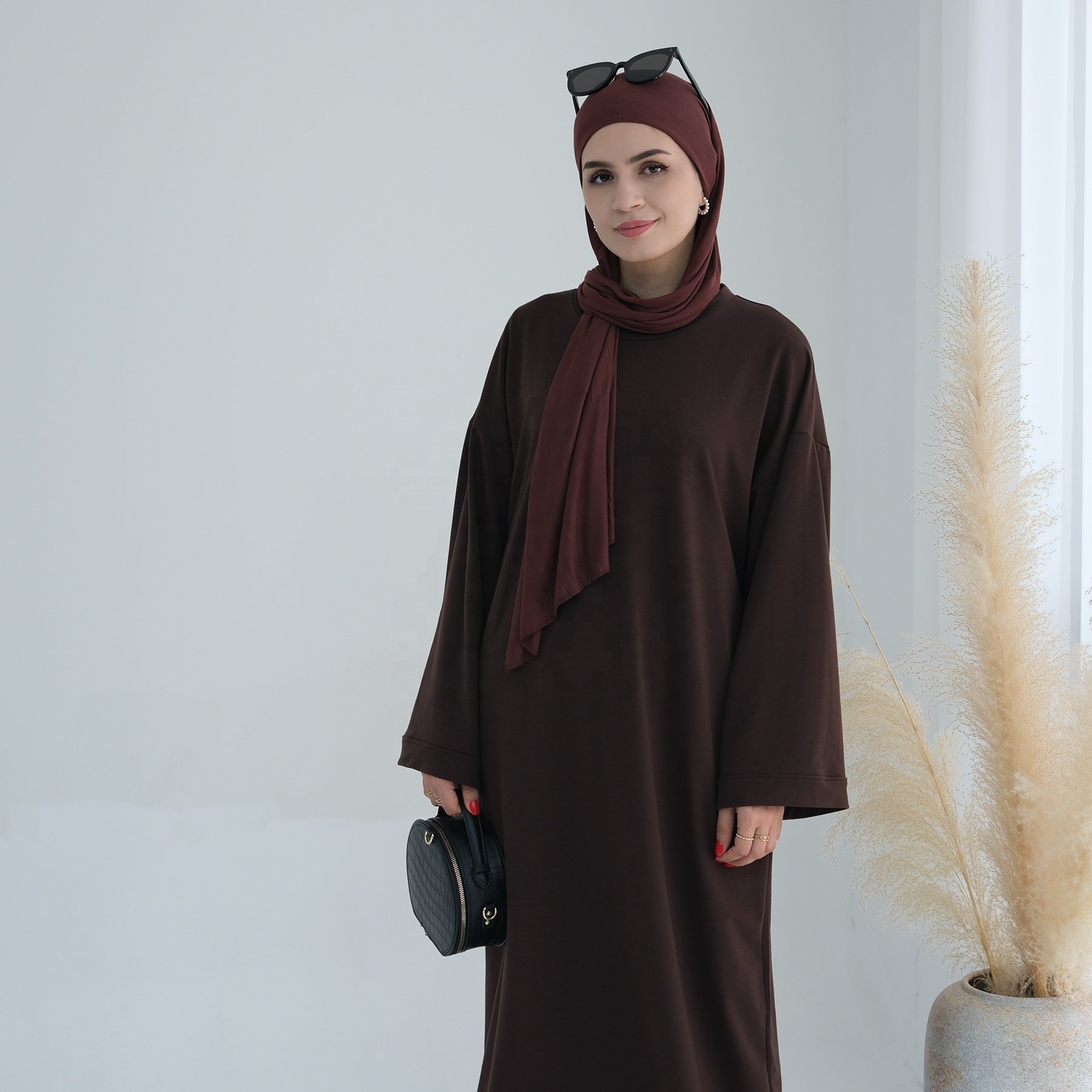 2024 Loriya Top Selling Long Sleeve Modest Dresses with Side Pockets Abaya Women Muslim Dress Women's Dresses