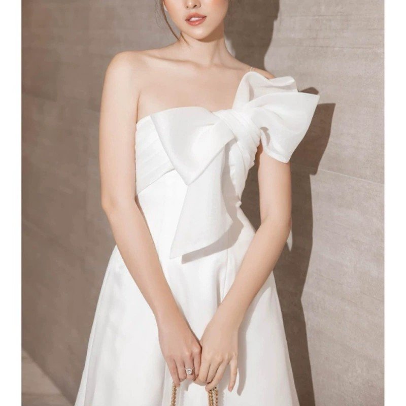 Small party dress niche design big bow oblique shoulder A-line dress high waist slim dress