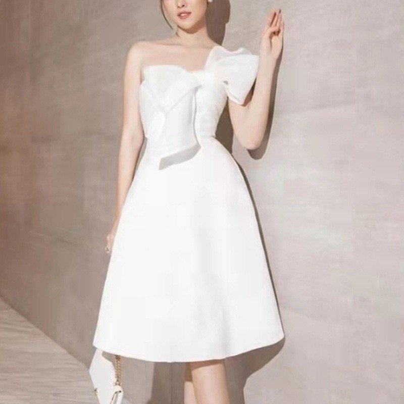 Small party dress niche design big bow oblique shoulder A-line dress high waist slim dress