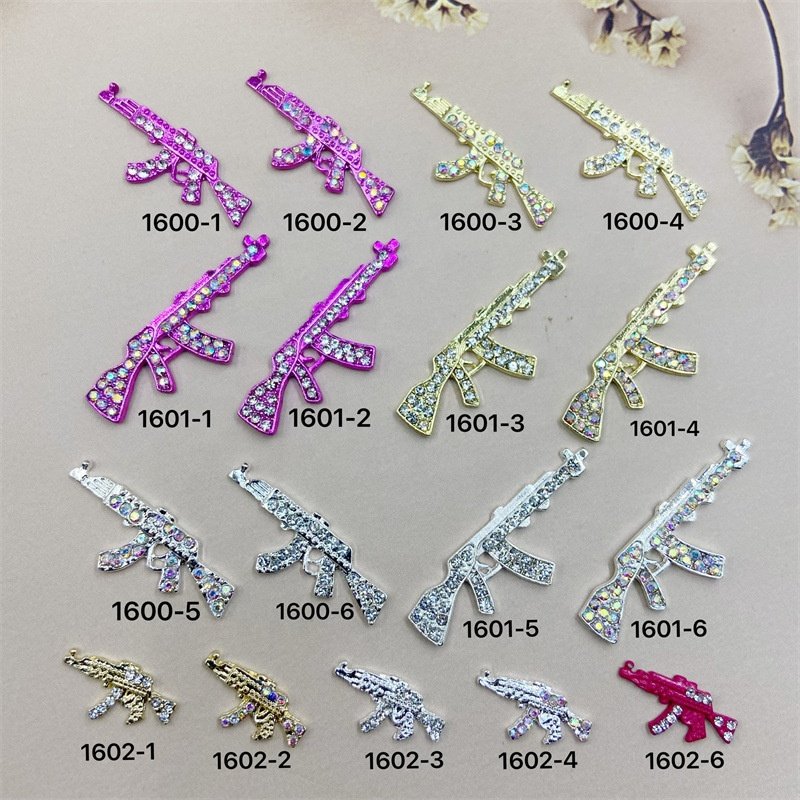 Qianya Luxury Alloy Gold Glitter Rabbit Heads Nail Charms Jewelry Luxury AB Color Nail Rhinestone Charms Diamond Gun Nail Decals