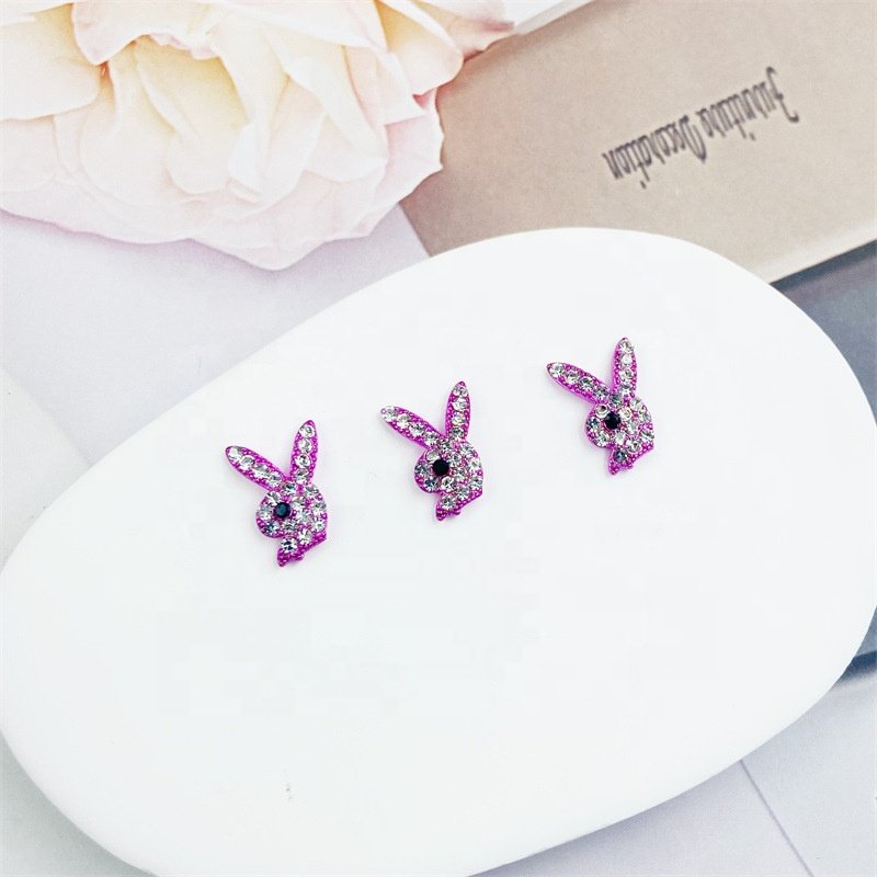 Qianya Luxury Alloy Gold Glitter Rabbit Heads Nail Charms Jewelry Luxury AB Color Nail Rhinestone Charms Diamond Gun Nail Decals