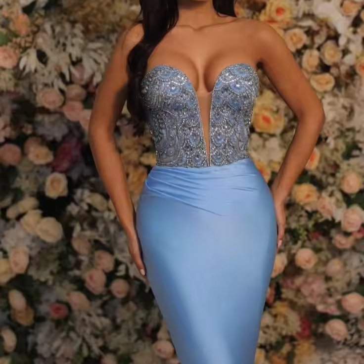 Elegant ladies' dress with rhinestone details suitable for a party High-quality clothing available wholesale