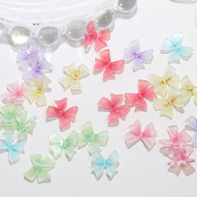 Hot Sale Colorful Bowknot Resin Nail Charms Fairy Ribbon Butterflies Resin Rhinestones Nail Art