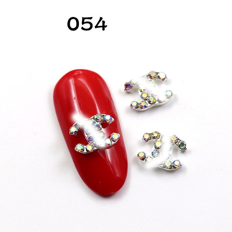 Qianya Brand Trend Zircon Nail Art Charm Kawaii Metal 3D Luxury Brand Logo Rhinestone Nail Charms Brand Nail Art Sticker Decals