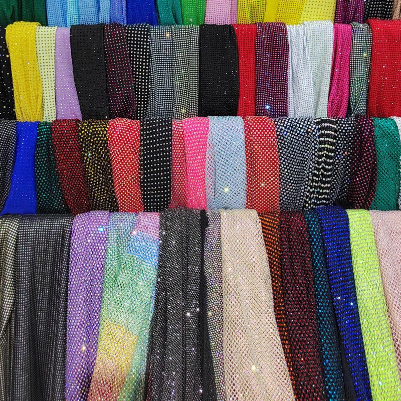 Low MOQ Custom Great Stretch Fish net mesh Fabric Sparkle Hollow Out Diamond AB Iridescent Crystal Rhinestone Fabric By The Yard