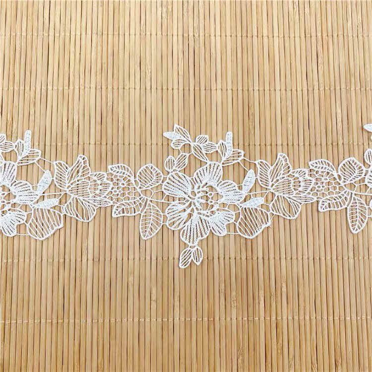Spot wholesale price 100% polyester fiber rose design hollow lace trim for garment decoration