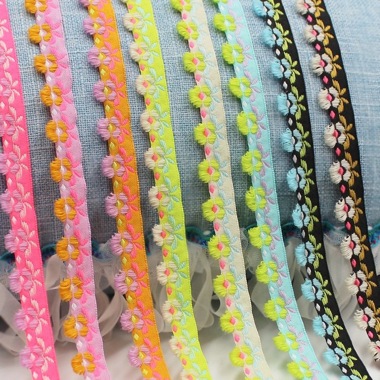 New arrivals 15mm narrow ethnic clothes decorative jacquard trims with mini loop tassels