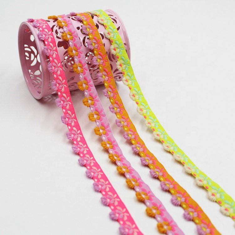 New arrivals 15mm narrow ethnic clothes decorative jacquard trims with mini loop tassels