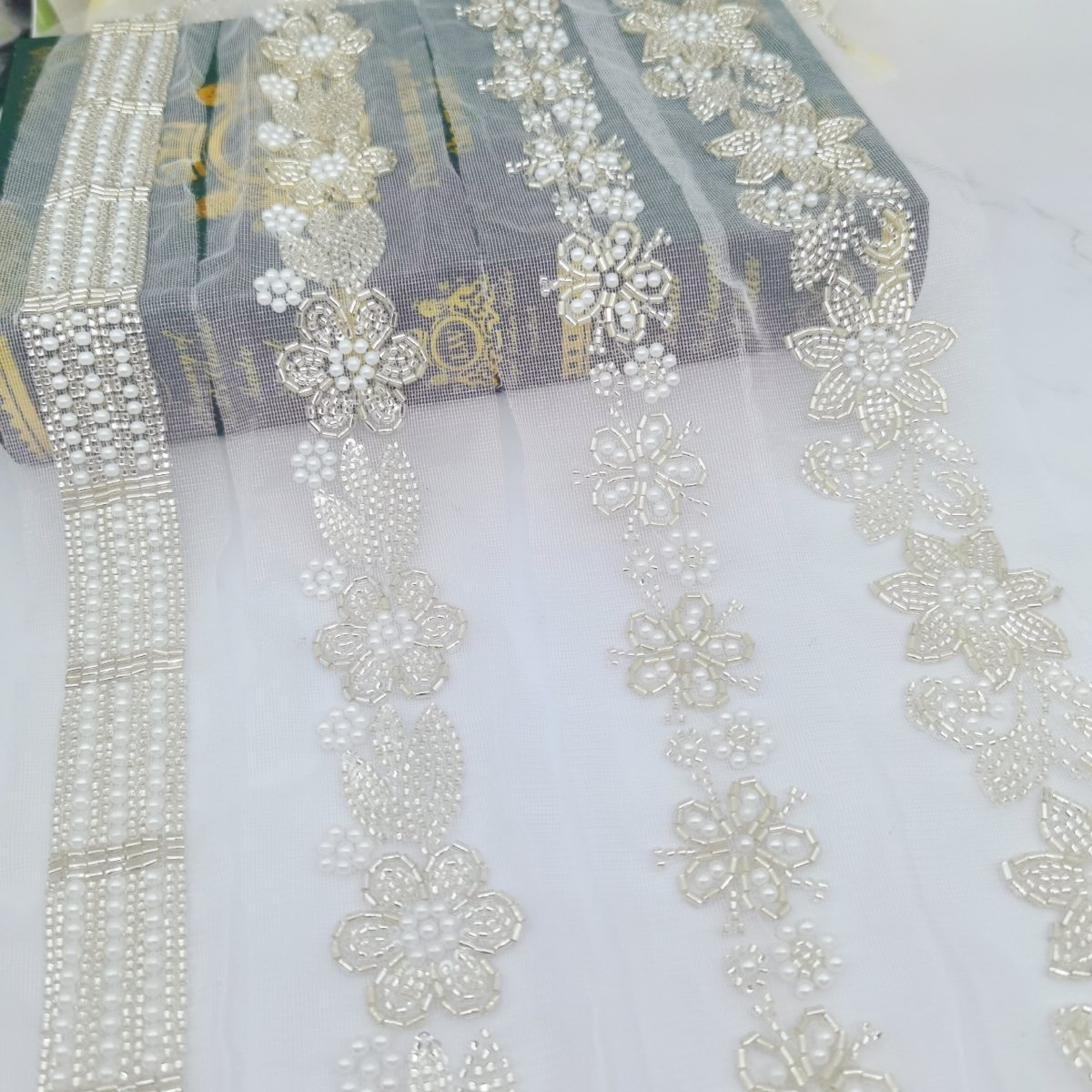 Guangdong Shantou Bao li Chi Milk lace clothing accessories fabric scarf robe belt wedding dress sequin beads white lace trim