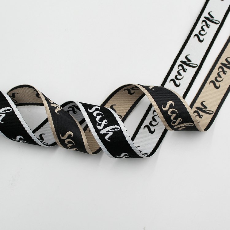 Custom 38mm polyester jacquard woven letter logo webbing trims for garment bags