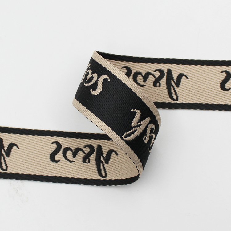 Custom 38mm polyester jacquard woven letter logo webbing trims for garment bags