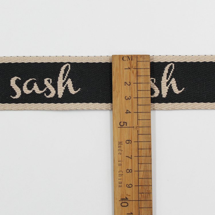Custom 38mm polyester jacquard woven letter logo webbing trims for garment bags