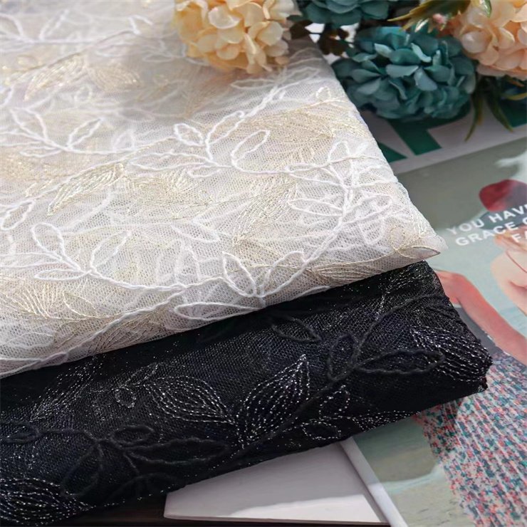 New design is mesh sheer fabric with floral embroidery lace decorate women's dresses wedding dressesand evening dresses