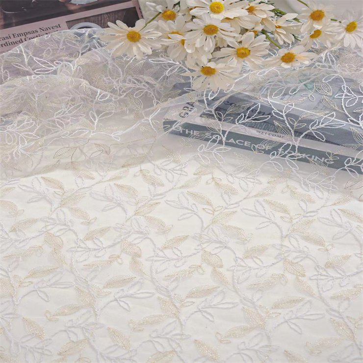 New design is mesh sheer fabric with floral embroidery lace decorate women's dresses wedding dressesand evening dresses
