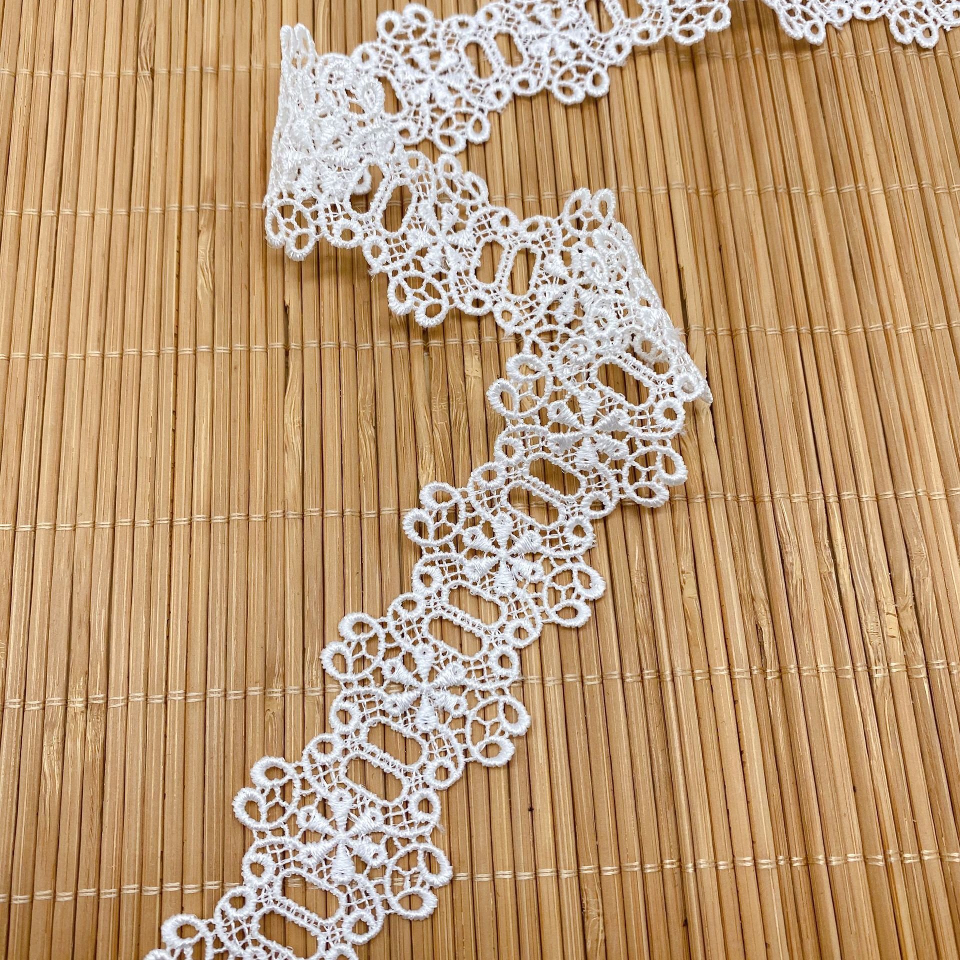 wholesale custom 33mm decorative embroidered guipure lace trim white sew-on bridal lace ribbon for skirt dress clothing LWS25