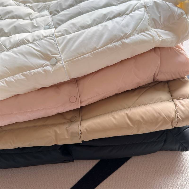 95%white goose velvet high luxury cattle stacking inside and outside wearing no inner biliary, the same color, light thin round neck down jacket winter