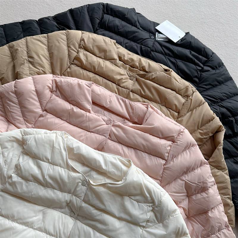 95%white goose velvet high luxury cattle stacking inside and outside wearing no inner biliary, the same color, light thin round neck down jacket winter
