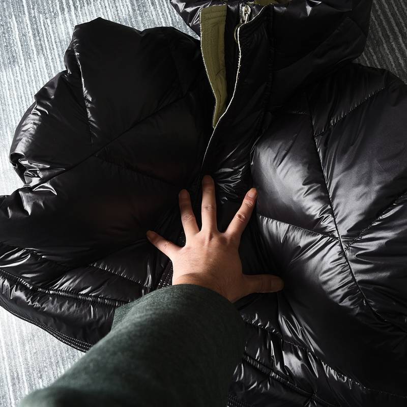 Ultra -thick mid -length down jacket at minus 30 degrees