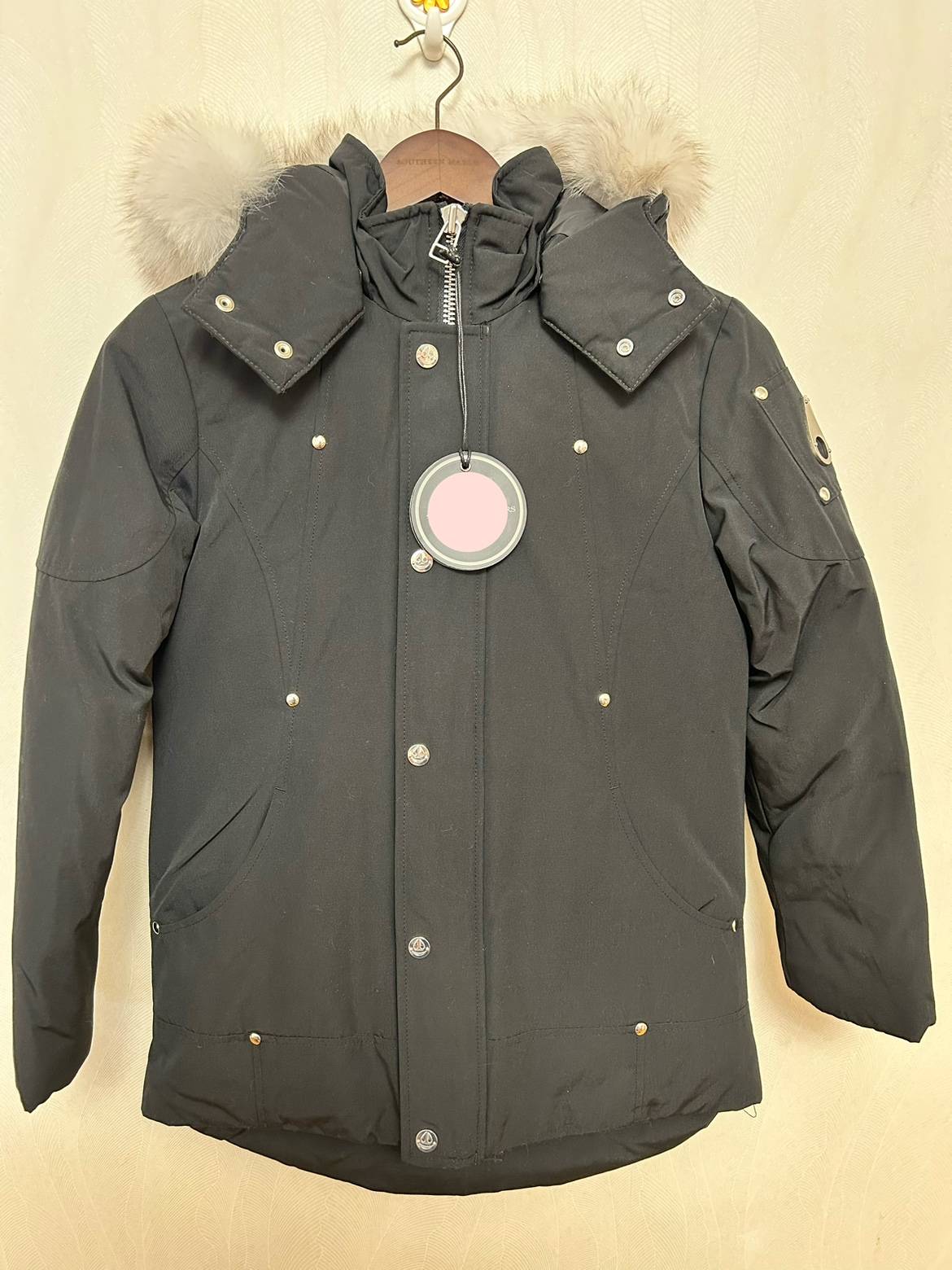 Men and girls in the same model, long -term wind -proof faction overcome down jackets