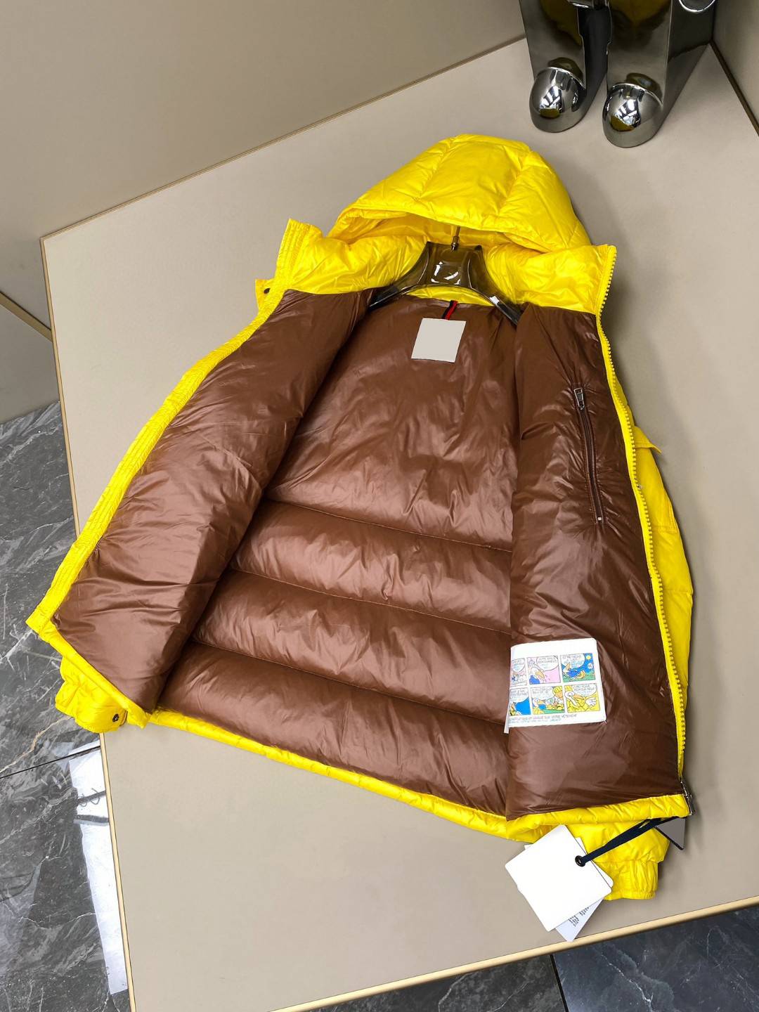 Stand up short men and women in the same thick yellow down jacket