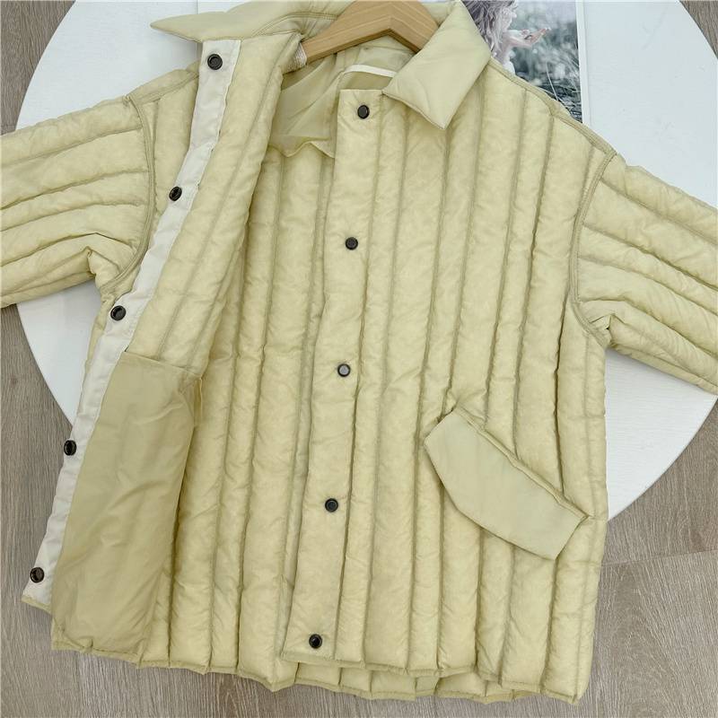 A bit interesting down jacket!Nordic niche pure tail concise high -end qi seam down jacket female 22 winter