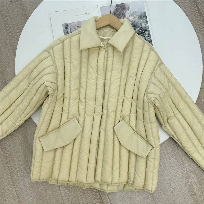 A bit interesting down jacket!Nordic niche pure tail concise high -end qi seam down jacket female 22 winter