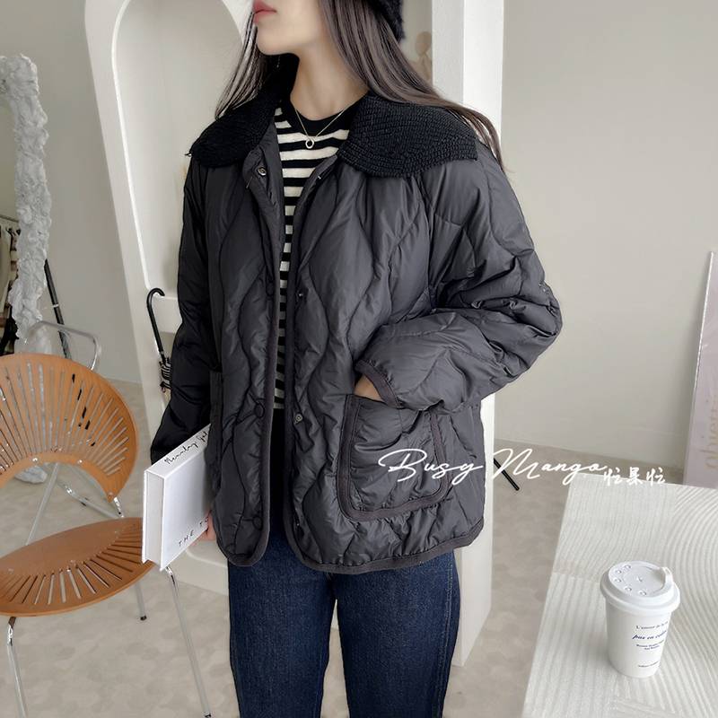 Irregular lapel stitching is thin down jacket jacket