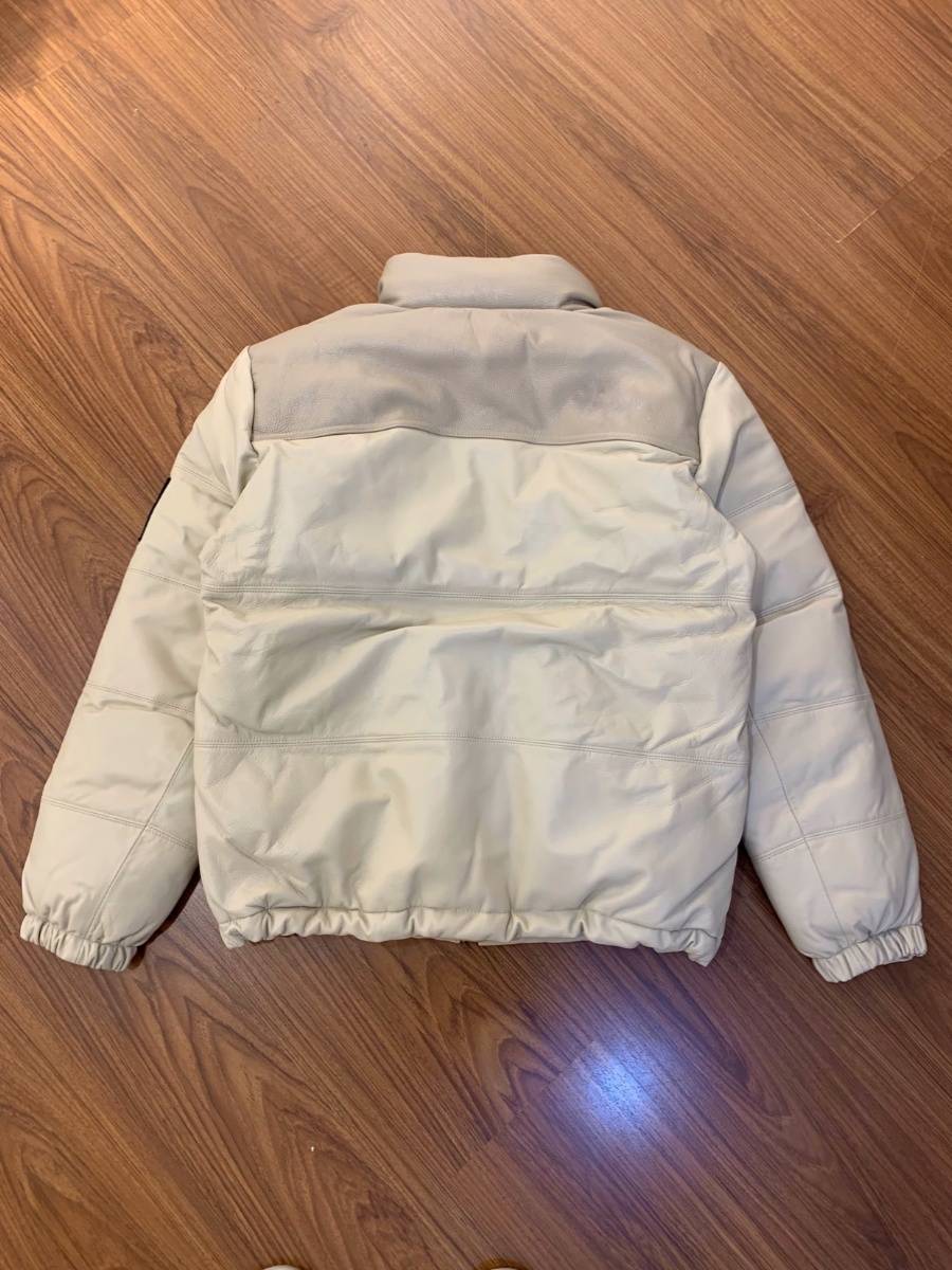 It is also a leather coat and a down -to -product nf series brand original single winter new product limited sheepskin down jacket